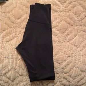 Used pair of lululemon black wunder under leggings